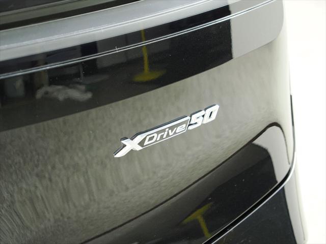 Photo of 2025 Black Sapphire Metallic BMW iX