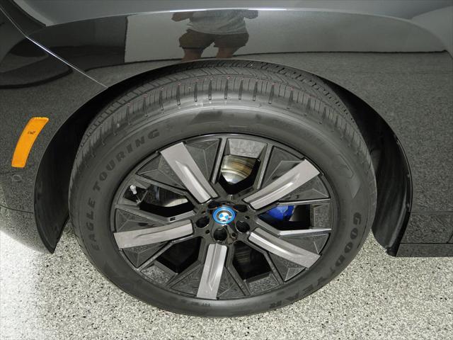 Photo of 2025 Black Sapphire Metallic BMW iX