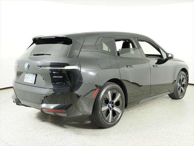Photo of 2025 Black Sapphire Metallic BMW iX