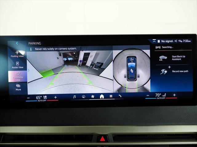 Photo of 2025 Black Sapphire Metallic BMW iX