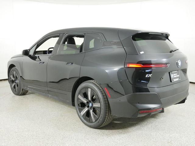 Photo of 2025 Black Sapphire Metallic BMW iX