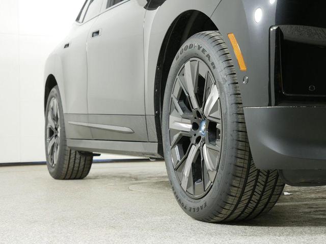 Photo of 2025 Black Sapphire Metallic BMW iX