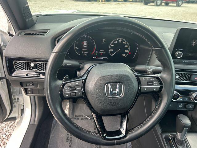Photo of 2024 Platinum White Pearl Honda Civic