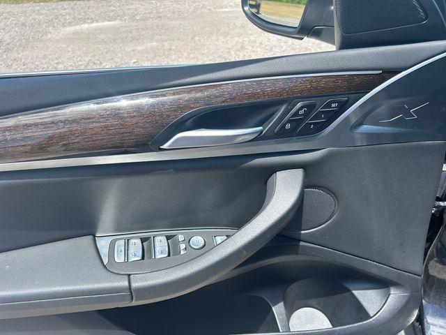 Photo of 2024 Black Sapphire Metallic BMW X4
