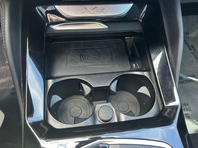 Photo of 2024 Black Sapphire Metallic BMW X4