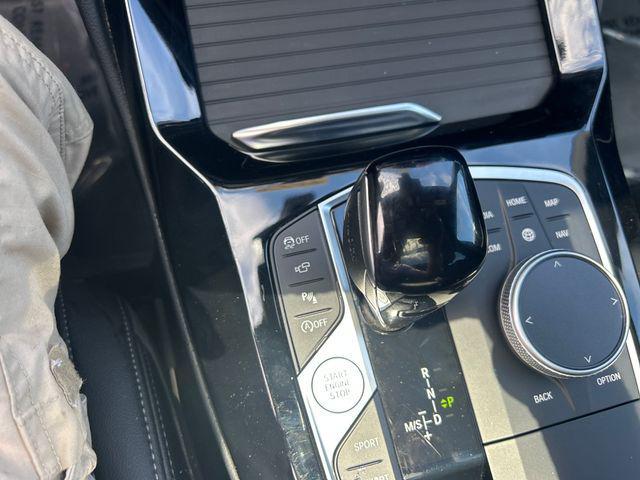 Photo of 2024 Black Sapphire Metallic BMW X4