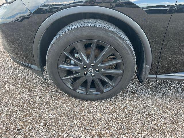 Photo of 2024 Super Black Nissan Murano