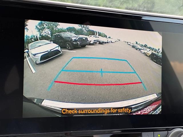 Photo of 2023 Midnight Black Metallic Toyota Highlander Hybrid