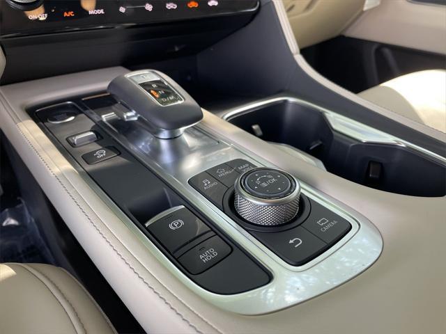 Photo of 2025 Moonbow Blue INFINITI QX60