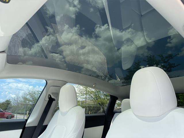 Photo of 2021 Pearl White Multi-Coat Tesla Model Y