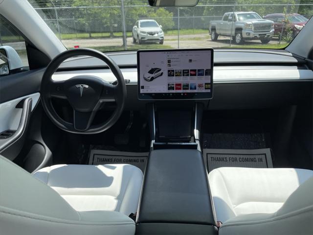 Photo of 2021 Pearl White Multi-Coat Tesla Model Y