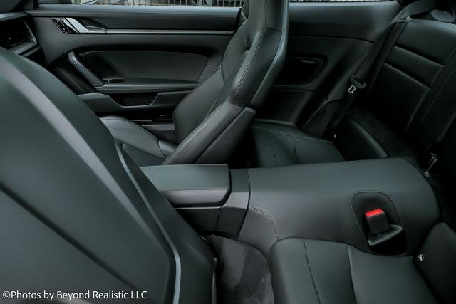 Photo of 2021 Gentian Blue Metallic w/Badlands Green Wrap Porsche 911