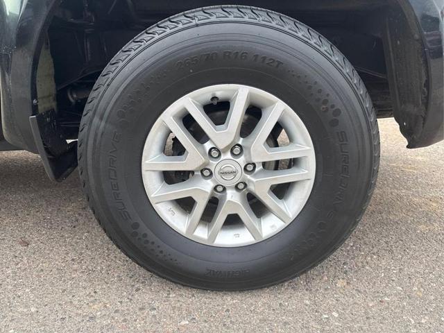 Photo of 2016 Magnetic Black Nissan Frontier