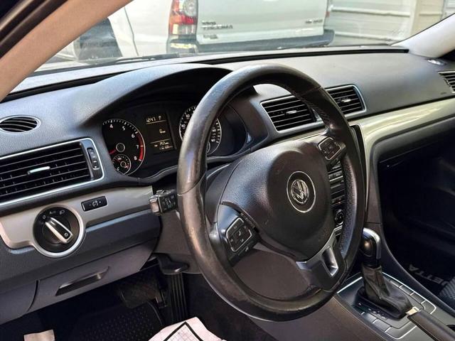 Photo of 2013 Black Volkswagen Passat