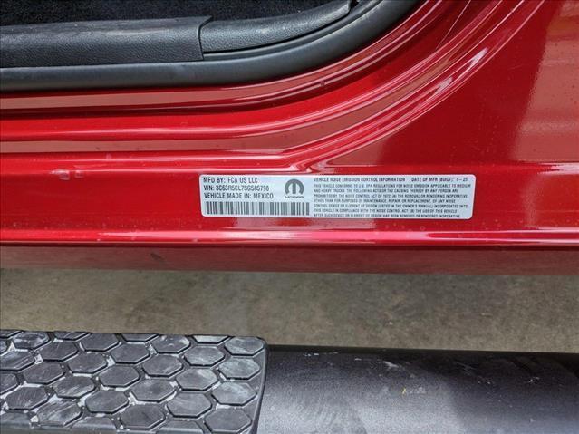 Photo of 2025 Molten Red Pearlcoat RAM 2500
