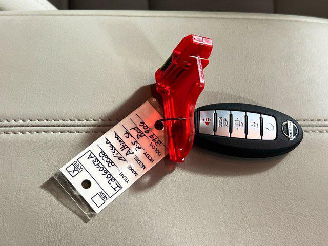 Photo of 2022 Scarlet Ember Tintcoat Nissan Altima