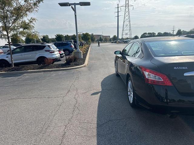 Photo of 2010 Super Black Metallic Nissan Maxima