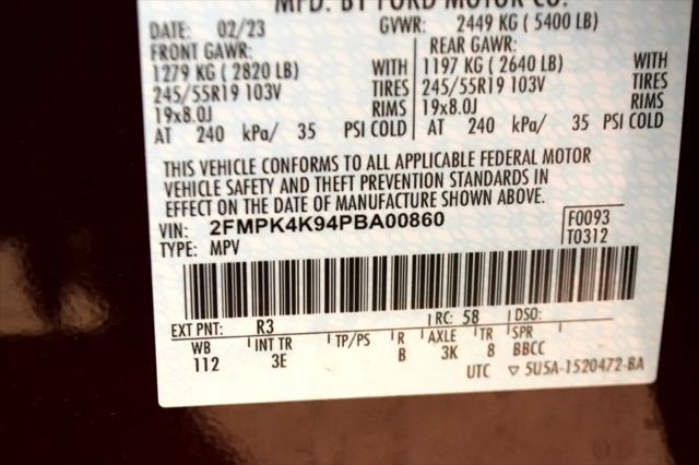 Photo of 2023 Burgundy Ford Edge