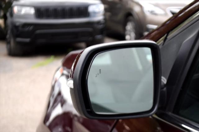 Photo of 2023 Burgundy Ford Edge