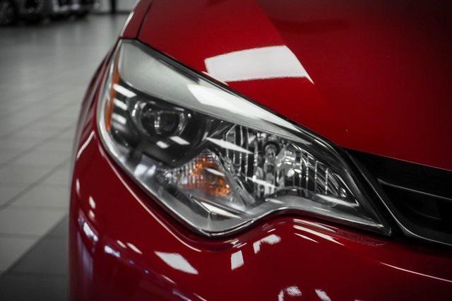 Photo of 2016 Barcelona Red Metallic Toyota Corolla