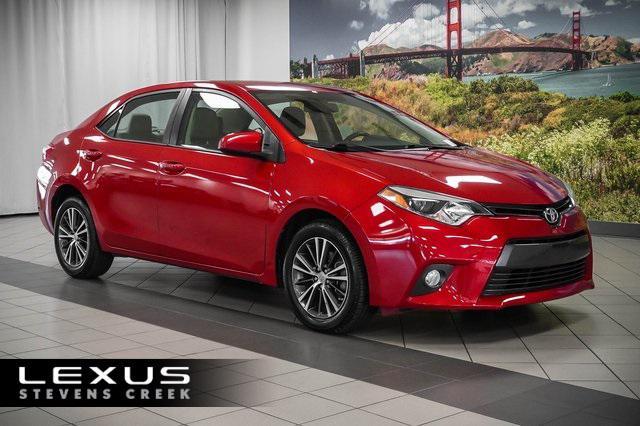 Photo of 2016 Barcelona Red Metallic Toyota Corolla