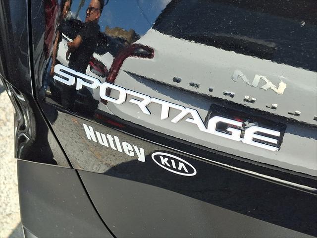 Photo of 2023 Ebony Black Kia Sportage
