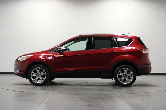 Photo of 2015 Ruby Red Metallic Ford Escape