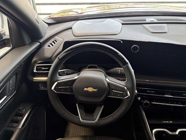 Photo of 2025 Radiant Red Tintcoat Chevrolet Traverse