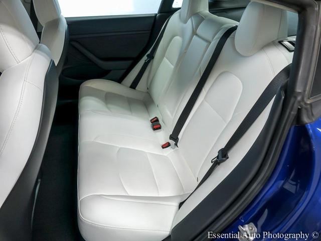 Photo of 2021 Deep Blue Metallic Tesla Model 3