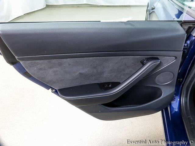Photo of 2021 Deep Blue Metallic Tesla Model 3