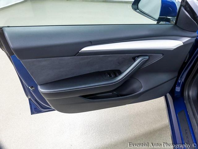 Photo of 2021 Deep Blue Metallic Tesla Model 3