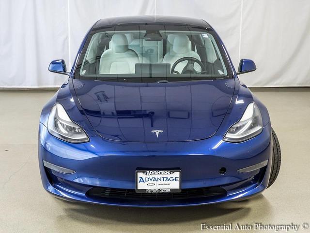 Photo of 2021 Deep Blue Metallic Tesla Model 3