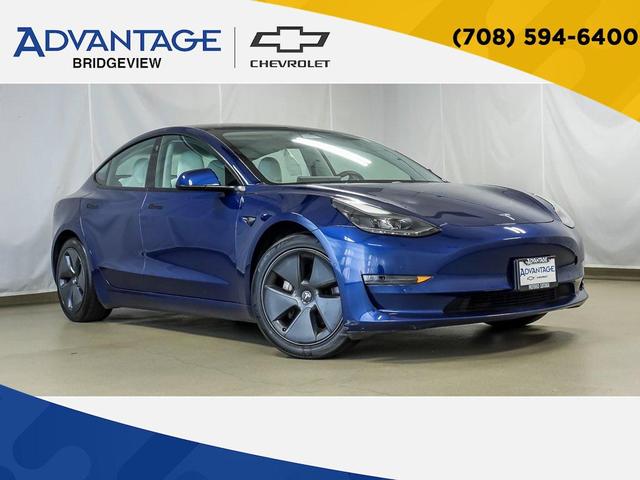 Photo of 2021 Deep Blue Metallic Tesla Model 3