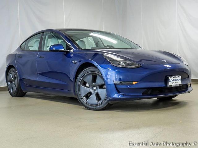 Photo of 2021 Deep Blue Metallic Tesla Model 3
