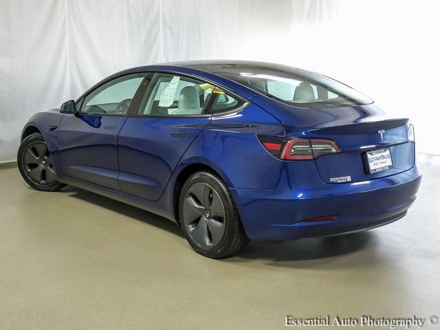 Photo of 2021 Deep Blue Metallic Tesla Model 3