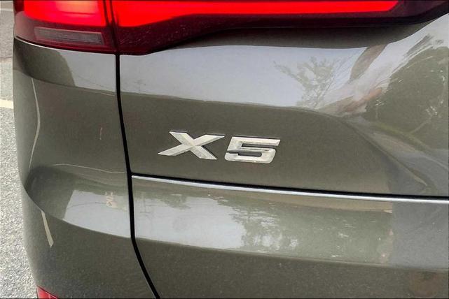 Photo of 2023 Manhattan Green Metallic BMW X5
