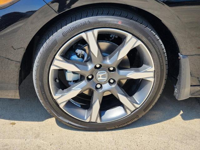 Photo of 2025 Crystal Black Pearl Honda Civic Hybrid