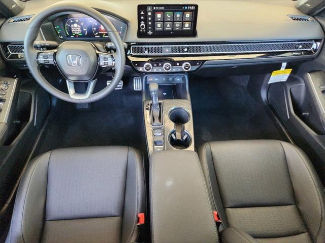 Photo of 2025 Crystal Black Pearl Honda Civic Hybrid