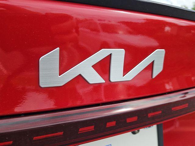Photo of 2024 Currant Red Kia Forte