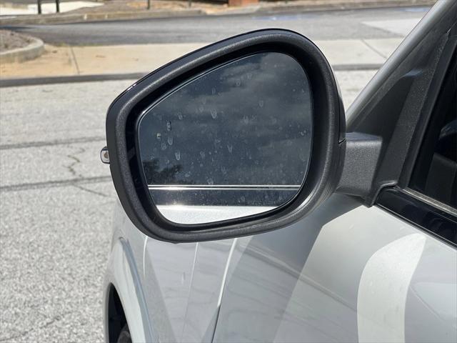 Photo of 2025 Star White Tri-Coat Ford Mustang Mach-E