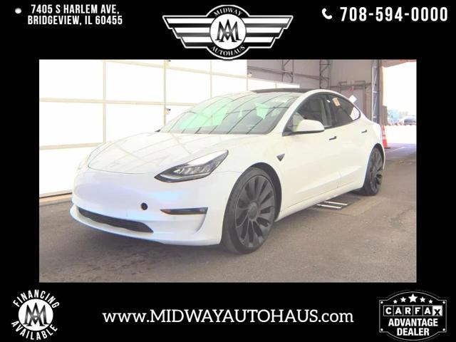 Photo of 2021 White Tesla Model 3