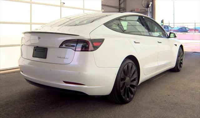 Photo of 2021 White Tesla Model 3