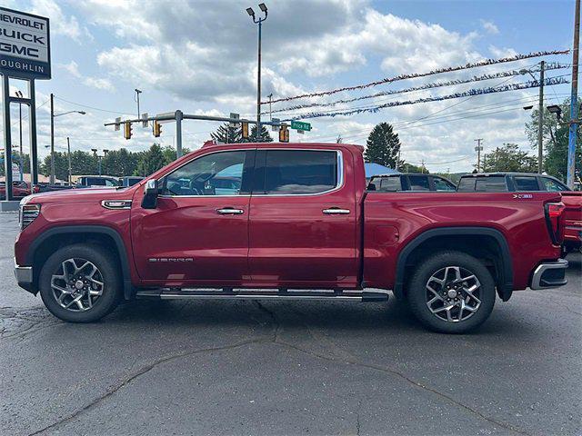 Photo of 2024 Volcanic Red Tintcoat GMC Sierra 1500