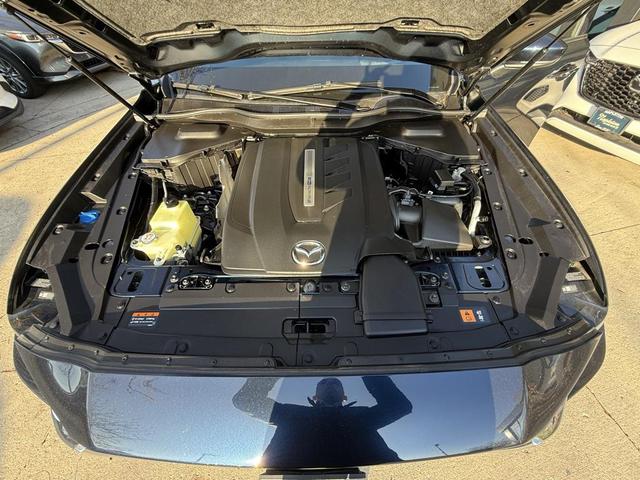 Photo of 2024 Deep Crystal Blue Mica Mazda CX-90 PHEV