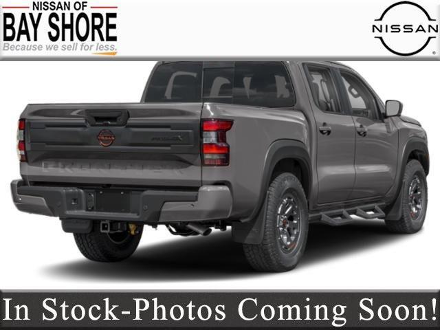Photo of 2025 Glacier White Nissan Frontier