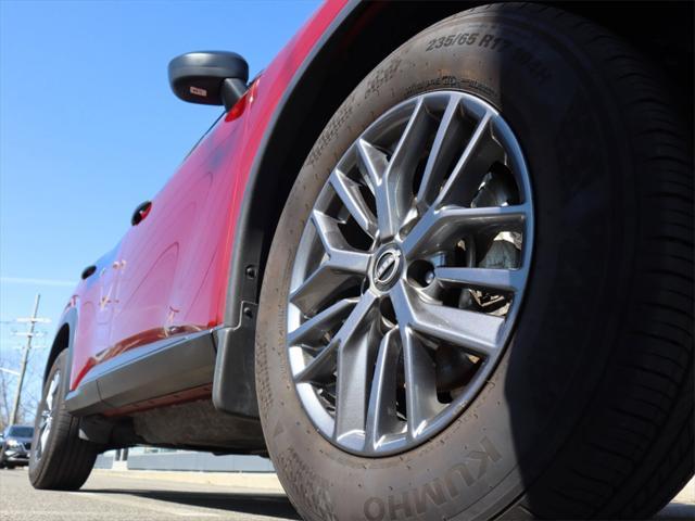 Photo of 2023 Scarlet Ember Tintcoat Nissan Rogue