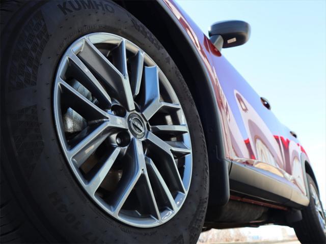 Photo of 2023 Scarlet Ember Tintcoat Nissan Rogue