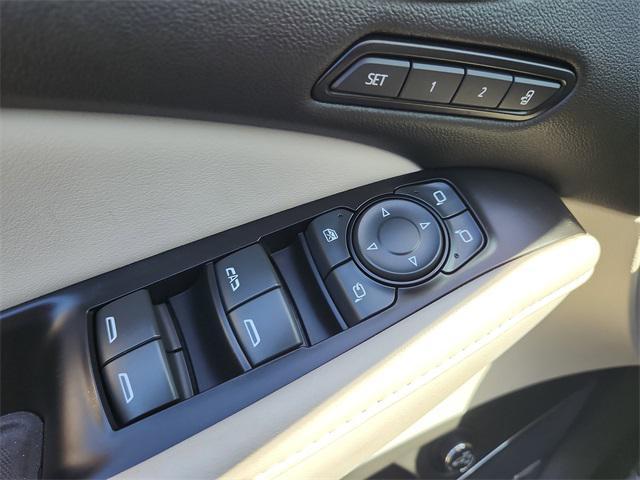 Photo of 2023 Cherry Red Tintcoat Buick Enclave