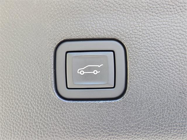 Photo of 2023 Cherry Red Tintcoat Buick Enclave