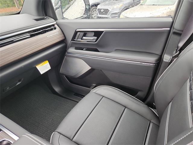 Photo of 2025 Summit White GMC Sierra EV